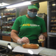 A worker wears a face mask while making a sandwich in a Subway store on June 12, 2020 in London, England.